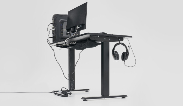 Messy cables of a typical sit-to-stand desk